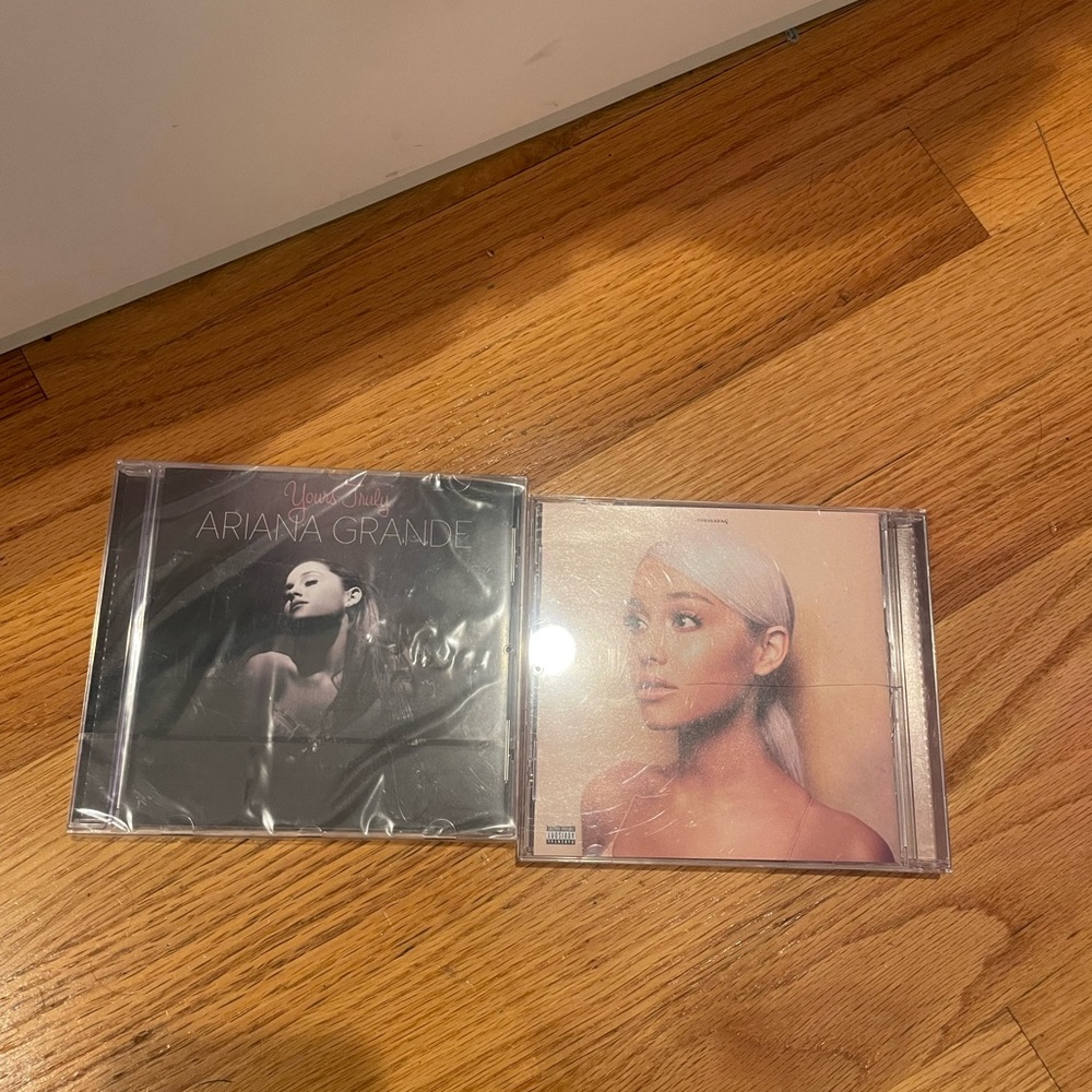 yours truly & sweetener ariana grande cds. LIGHTLY USED / UNOPENED